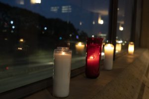 Candles were lit in support of medical workers and their families along the edge of the Cathedral of Our Lady of the Angels plaza overlooking the 101 freeway in downtown Los Angeles. (Sarah Yaklic)