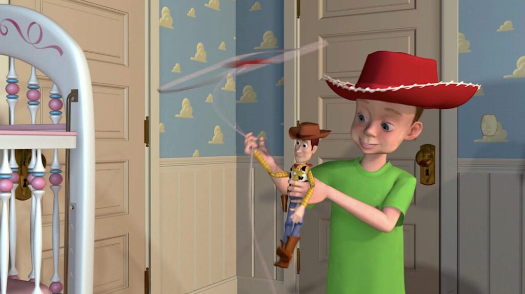 Andy juega con su juguete favorito, Woody, en “Toy Story”. (IMDB)