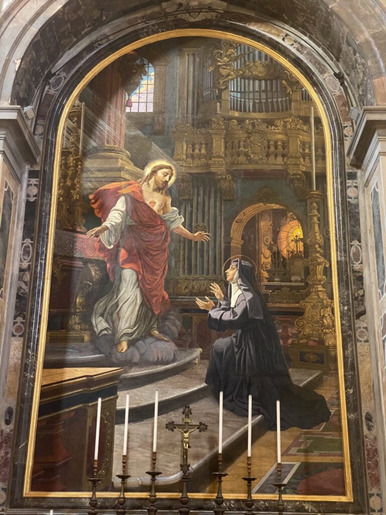 “El altar del Sagrado Corazón” representa una visión del Sagrado Corazón de Jesús a Santa Margarita María de Alacoque en la Basílica de San Pedro, en Roma, Italia. Obra de Carlo Muccioli (1857-1931), artista italiano. (Mark Laurance vía Wikimedia Commons)