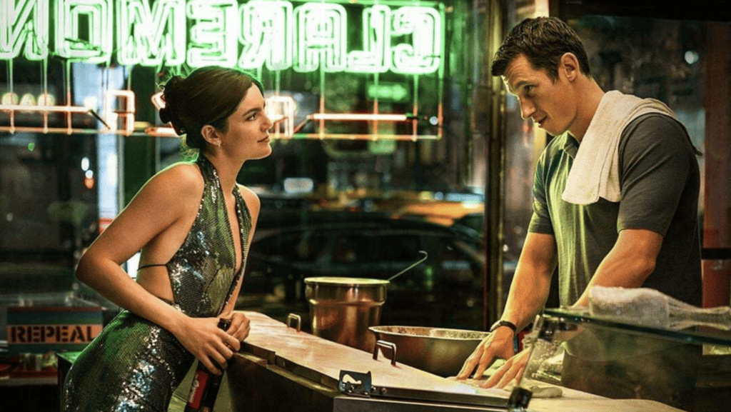 Monica Barbaro y Callum Turner en una imagen promocional de la película “One Night Only”. (©Universal Pictures vía IMDb)
